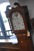 A 19th Century oak cased longcased clock having eight day movement with painted arch dial for Jas
