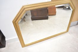 A vintage gilt wood over mantel mirror, approx. 102 x 73cm