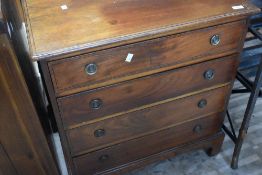 An Edwardian (regency revival style) dwarf chest of four long drawers, dimensions approx. width 70
