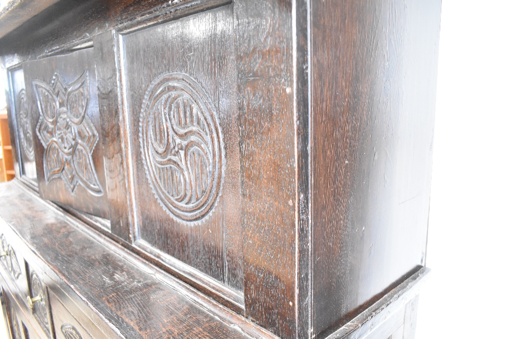 A period oak court cupboard of typical design with foliate carving throughout, dimensions approx. - Image 2 of 3