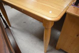 A modern Ercol dining table having square top , 110cm
