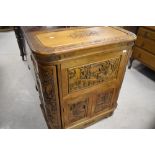 An Oriental drinks cabinet having top and front openings, dimensions approx. Width 78 depth 41