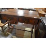 A reproduction Regency sofa style drop end coffee table, having two frieze drawers, approx. 65 x