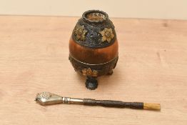 A vintage Argentine yerba mate gourd cup, having floral and foliate silver-plated and gilt