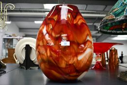 A large 20th-century Susan Rankin-style studio art glass vase, featuring an exquisite swirled molten