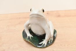 A fine early to mid 20th-century pottery frog sculpture, featuring an ivory crackle glaze finish,