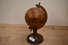 A small 20th-century Italian wooden Olde World Globe, marked to base, 23cm, condition is