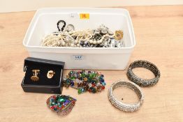 An assortment of costume jewellery, including faux pearls, cufflinks and statement pieces