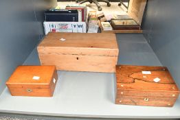 Three late 19th to early 20th-century wooden boxes, to feature a mother-of-pearl inlaid rosewood