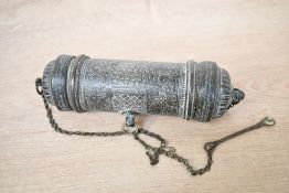 Thought to be 19th-century Indian brass cylindrical talisman holder, featuring embossed floral and
