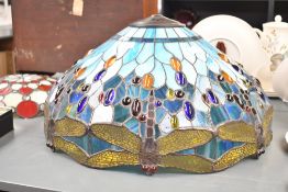 A large 20th-century Tiffany-style Dragonfly lamp shade, featuring a blue leaded shade with