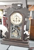 A late 19th-century American Ansonia Clock Company ebonised wood mantel clock, of Roman hours,