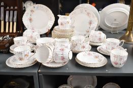 A selection of 20th-century Grosvenor bone china wares, featuring delicate floral detailing with