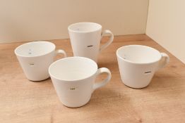 Four contemporary Keith Brymer Jones porcelain mugs/cups, to feature hand stamped 'coffee' and 'tea'
