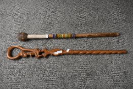 Of ethnographic interest, two 20th-century African Tribal Art wooden canes, to feature a hand carved