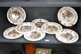 Eight late 20th-century Wedgwood bone china 'Foxwood Tales' decorative plates, to feature a