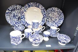 A quantity of Emma Bridgewater pottery 'Blue Wallpaper' wares, featuring deep blue floral and folia