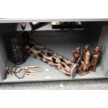 A quantity of 20th-century hand carved African Art, to feature four wooden stylised male spirit-