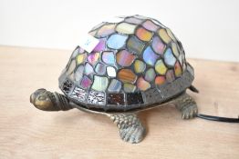 A late 20th-century Tiffany-style turtle table lamp, featuring a sweetly formed metal turtle base