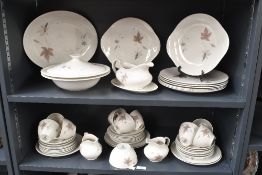 A selection of 20th-century Royal Doulton 'Tumbling Leaves' china tableware, featuring delicate