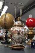 A late 20th-century Japanese Satsuma-style porcelain ginger jar table lamp, featuring colourful