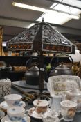 A 20th-century Tiffany-style table lamp, featuring a colourful hexagonal shade with Art Nouveau-