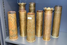 Four pairs of fine British and French World war I brass trench art shell cases, each finely hand