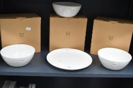 A selection of contemporary Keith Brymer Jones 'Word Range' porcelain bowls and single plate, to