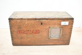 A early to mid 20th-century pine Railway First Aid Case, featuring a small glass window holding a