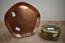 An early 20th-century Teacher's Highland Cream Whisky hammered copper advertising tray; sold with