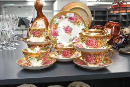 A 20th-century Grosvenor bone china roses part tea set, featuring floral decoration with gilt
