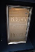 A large vintage Brown Cow Hotel mirrored wall sign, within a gilt rectangular frame, 90cm x 50cm,