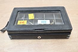 A faux leather jewellery box, containing an assortment of cufflinks, including novelty pen