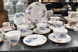 A selection of vintage Colclough 'Nigela' bone china wares, featuring delicate blue floral
