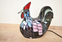 A late 20th-century Tiffany-style Chicken table lamp, featuring a seated chicken of colourful