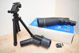A boxed Piccolo Compact 15~45x60 spotting scope and Tripod sold with an as found Opticron Mighty