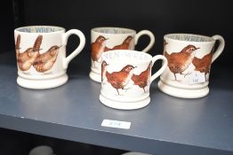 Four Emma Bridgewater Pottery 'Wren' mugs, to feature three half pint examples and one 1/4 pint, al