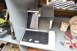 A small quantity of vintage hand held technology, to feature a Samsung tablet, a small keyboard,
