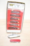 A vintage German CK Craftsman Collection of pocket knifes and multi tools, featuring stainless steel