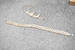 Of ethnographic interest, two early to mid 20th-century Papua New Guinea hand woven cowrie shell
