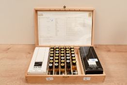 A selection of vintage Jean Pierre Sand fragrance advertising box, featuring small glass bottles