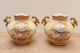 Two Victorian S. Fielding and Company pottery baluster vases with double gilded handles, renamed