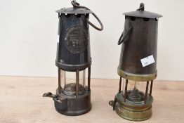 Two early 20th-century brass and metal miners lamps, to feature a Type SL example after The