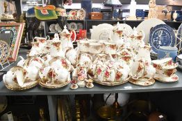 A large quantity of 20th-century Royal Albert 'Old Country Rose' bone china tablewares, with