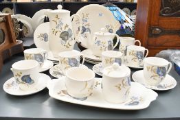 A 20th-century Sylvac 'Lime Grove' ceramic tea set, featuring a blue and brown floral pattern, to