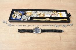 A collection of costume jewellery, including paste set pieces, wristwatches and brooches