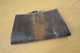 A 20th century vintage brown snakeskin clutch bag, white metal / chrome hardware clasp closure,