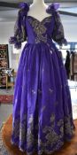 An Emanuel London ball gown in purple 100% silk with golden lace crochet embroidery, sweethear