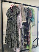 A collection of 20th century vintage garden party and cocktail dresses in various fabrics, cuts