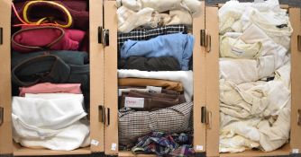A miscellaneous quantity of ladies clothing comprising tops, knitwear, fleeces, trousers and skirts,